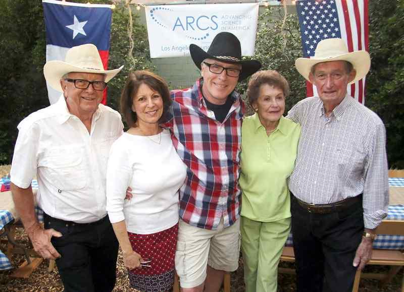 From left: Jack Hall, Judi and Rick Kiel and Jeanne and Bob Jenkins at the Texas barbecue. (Photo by James Carbone)